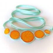 Statement necklace in shades of orange, yellow and aqua, spring fashion, ceramic jewelry